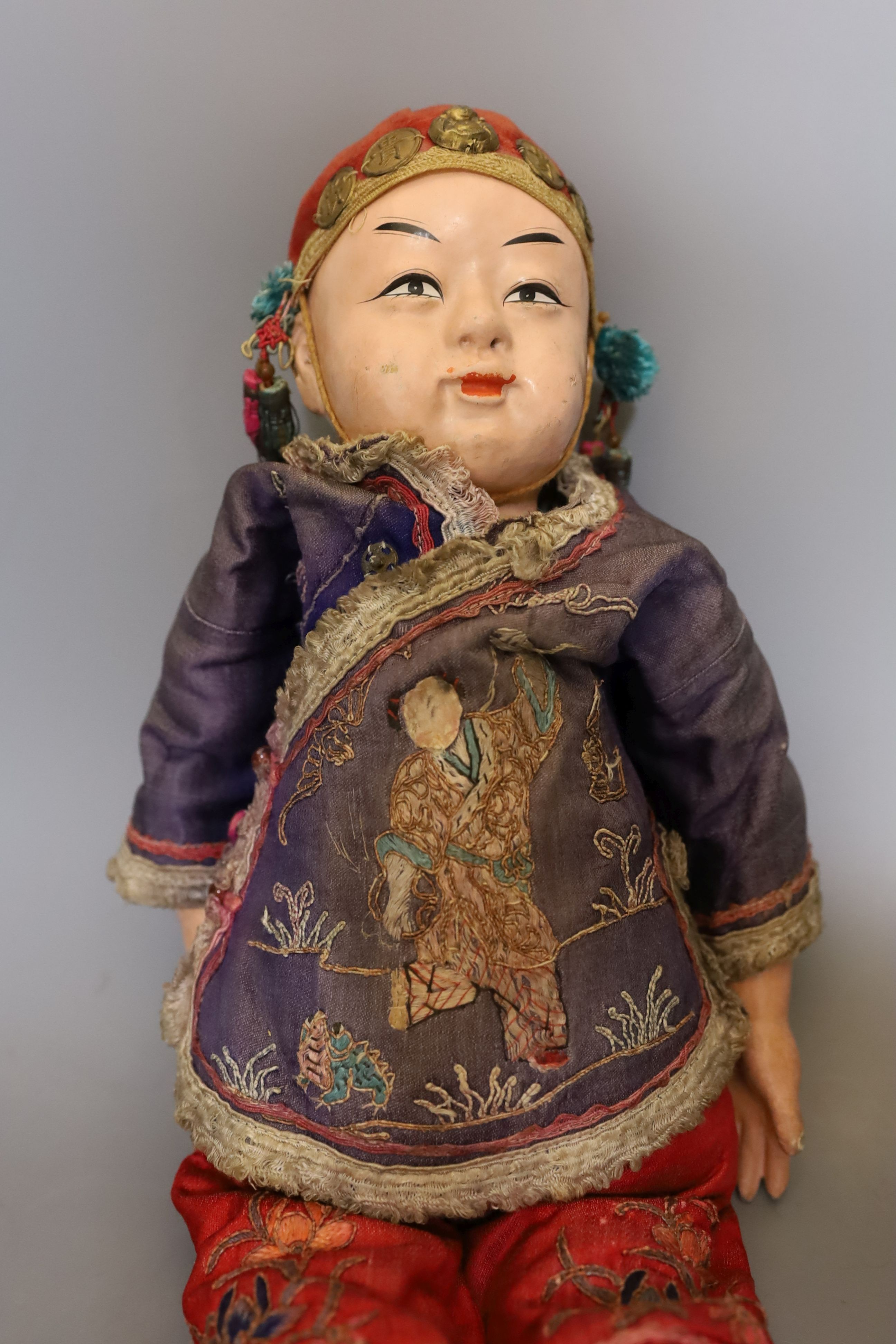 A papier mache doll, a Chinese boy in Chinese costume - 40cm high